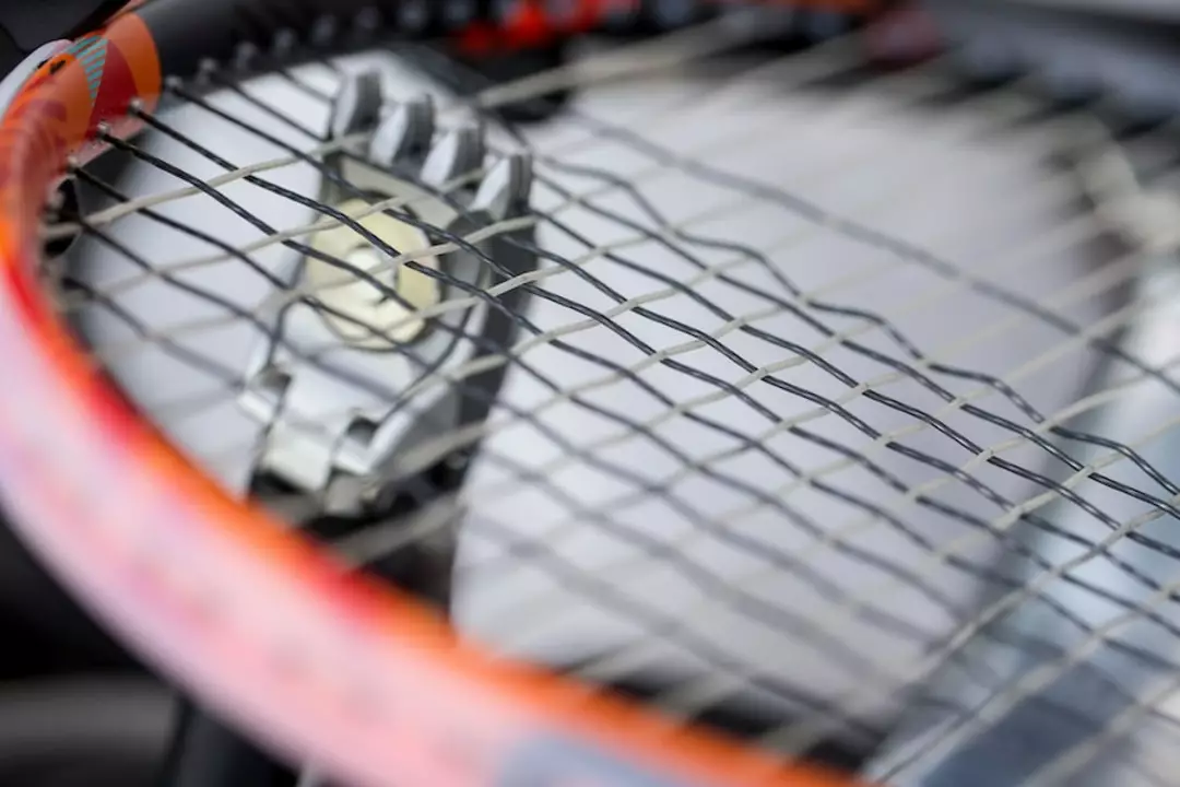 How much tension do you put on tennis racquet?